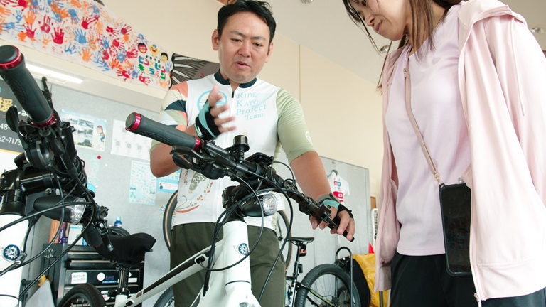 Kato City Bicycle Hub staff warmly welcoming cyclists