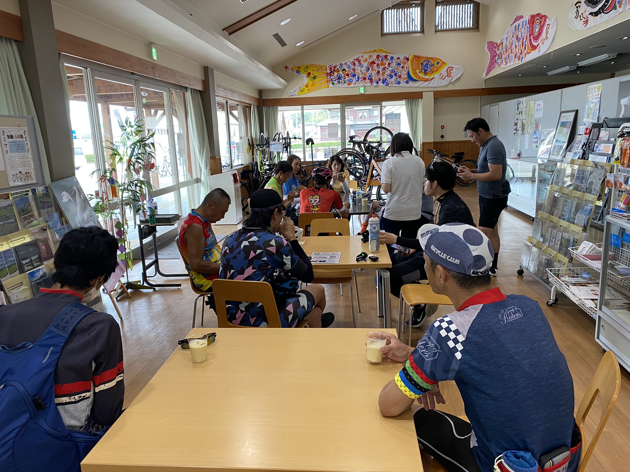 Cyclists relaxing at Kato City Bicycle Hub's rest area